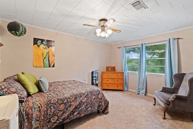 1603 Purple Sage, Horseshoe Bay, TX 78657 - bedroom with carpet floors, ornamental molding, a ceiling fan, and baseboards