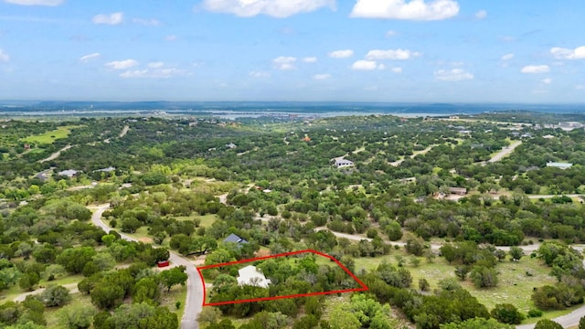 1603 Purple Sage, Horseshoe Bay, TX 78657 - aerial overview of property's location featuring property boundaries highlighted and a heavily wooded area