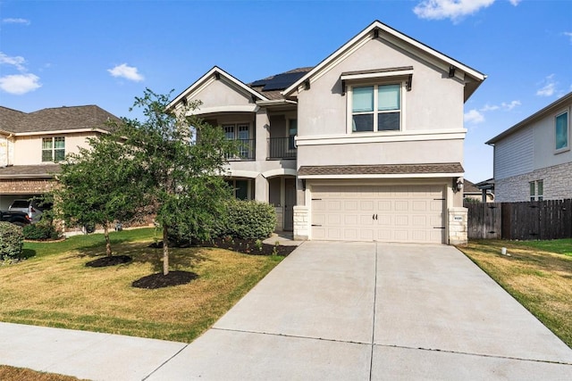 16816 Caperi Dr, Pflugerville, TX 78660 - view of front facade featuring stucco siding, solar panels, a garage, driveway, and a balcony