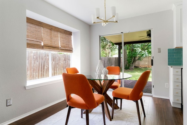 9325 Linkmeadow Dr, Austin, TX 78748 - dining space featuring plenty of natural light, wood finished floors, and a chandelier
