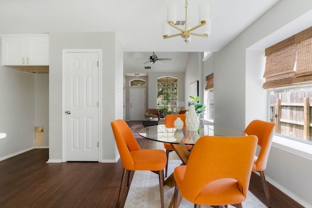 9325 Linkmeadow Dr, Austin, TX 78748 - dining area featuring a chandelier, wood finished floors, baseboards, and ceiling fan