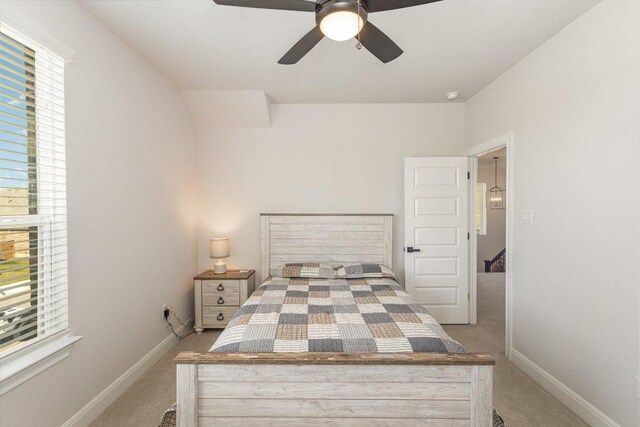 119 Nandina Path, Bastrop, TX 78602 - bedroom featuring carpet, baseboards, and ceiling fan