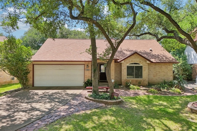 13204 Tamayo Dr, Austin, TX 78729 - ranch-style home featuring a garage, driveway, brick siding, roof with shingles, and a front lawn