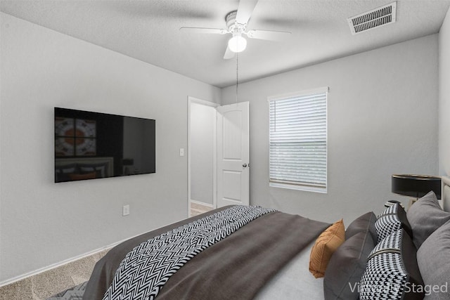 6000 Shanjia Dr, Austin, TX 78724 - bedroom featuring carpet, baseboards, and ceiling fan