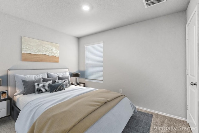 6000 Shanjia Dr, Austin, TX 78724 - bedroom with carpet, baseboards, and a textured ceiling