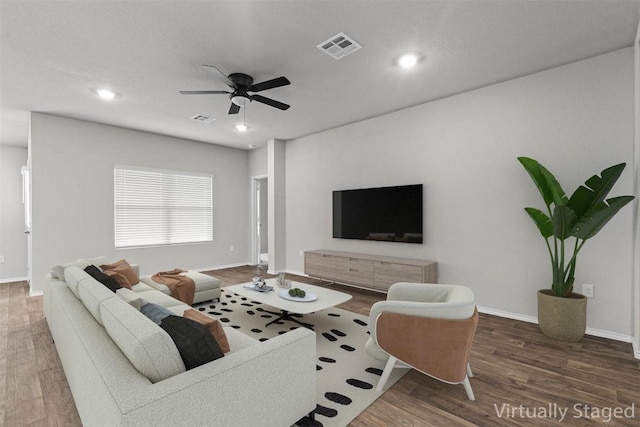 6000 Shanjia Dr, Austin, TX 78724 - living area with a ceiling fan, wood finished floors, recessed lighting, and baseboards
