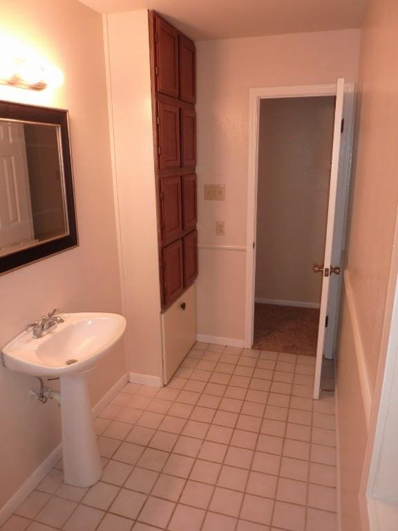 13603 Overland Pass, Bee Cave, TX 78738 - bathroom with tile patterned flooring and baseboards