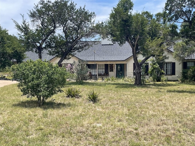 13603 Overland Pass, Bee Cave, TX 78738 - view of front of home featuring a front lawn and roof with shingles