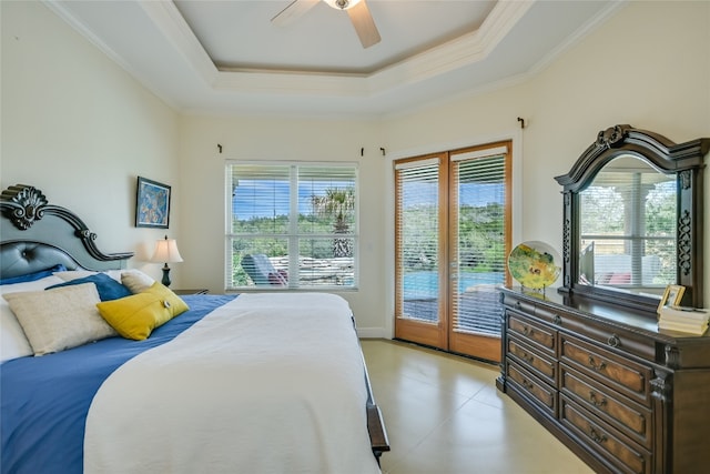 4908 Canyon Ranch Trl, Spicewood, TX 78669 - bedroom featuring access to outside, a tray ceiling, ornamental molding, and a ceiling fan