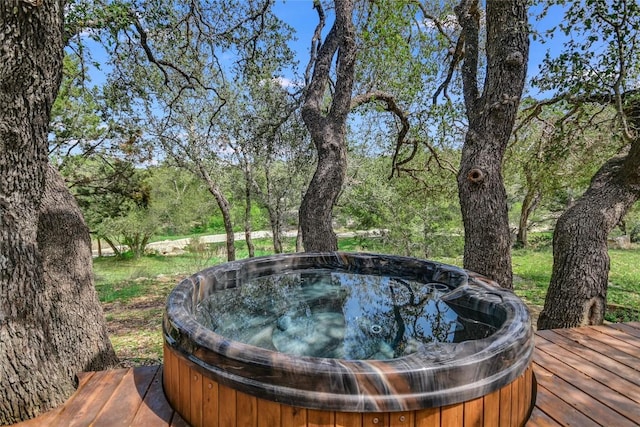 4908 Canyon Ranch Trl, Spicewood, TX 78669 - deck with a hot tub