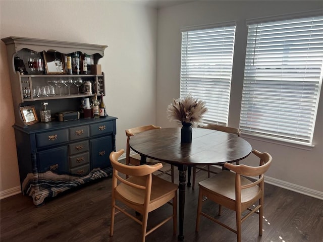 248 Lone Cedar Rd, Marble Falls, TX 78654 - dining area featuring dark wood-type flooring and baseboards