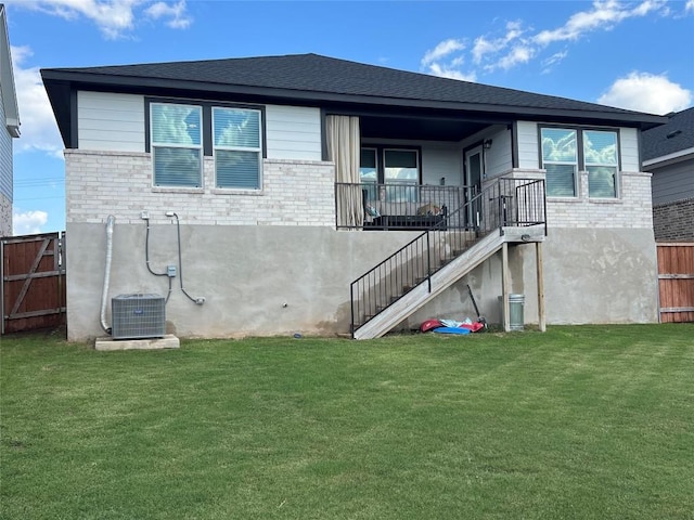 248 Lone Cedar Rd, Marble Falls, TX 78654 - rear view of house with stairway, central AC, and brick siding