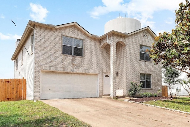 2727 High Point Dr, Round Rock, TX 78664 - view of front of property with a garage, driveway, and brick siding