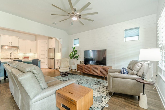 305 Dashing Sycamore St, San Marcos, TX 78666 - living room featuring ceiling fan and dark wood-style flooring