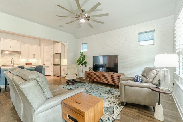 305 Dashing Sycamore St, San Marcos, TX 78666 - living area with a ceiling fan and dark wood-style flooring