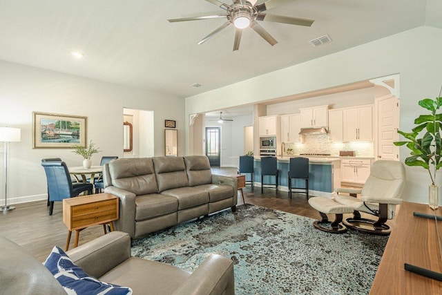 305 Dashing Sycamore St, San Marcos, TX 78666 - living room with ceiling fan, dark wood-type flooring, and baseboards