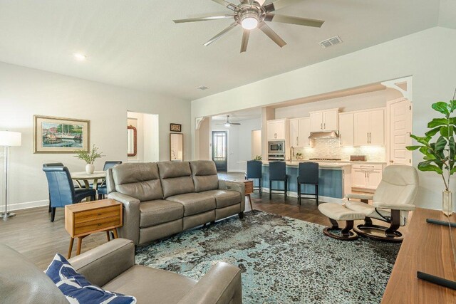 305 Dashing Sycamore St, San Marcos, TX 78666 - living room with ceiling fan, dark wood-type flooring, and baseboards
