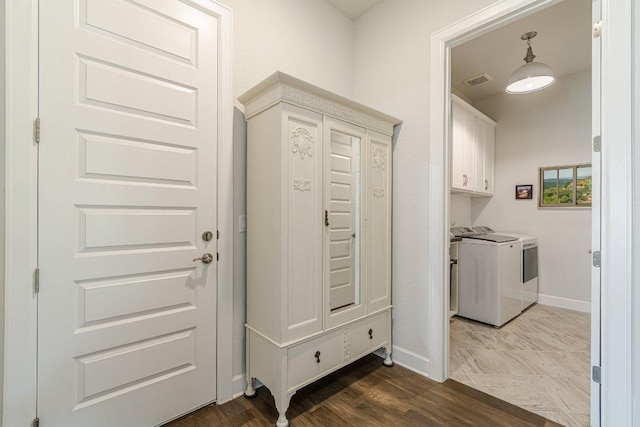 305 Dashing Sycamore St, San Marcos, TX 78666 - washroom featuring washer and dryer, baseboards, and cabinet space