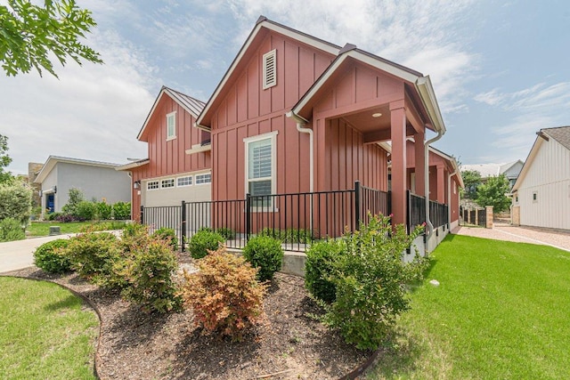 305 Dashing Sycamore St, San Marcos, TX 78666 - view of front of house featuring board and batten siding, a garage, and concrete driveway