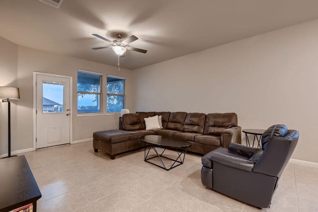 233 Mcfarland St, Georgetown, TX 78628 - living area with ceiling fan, baseboards, and light tile patterned floors