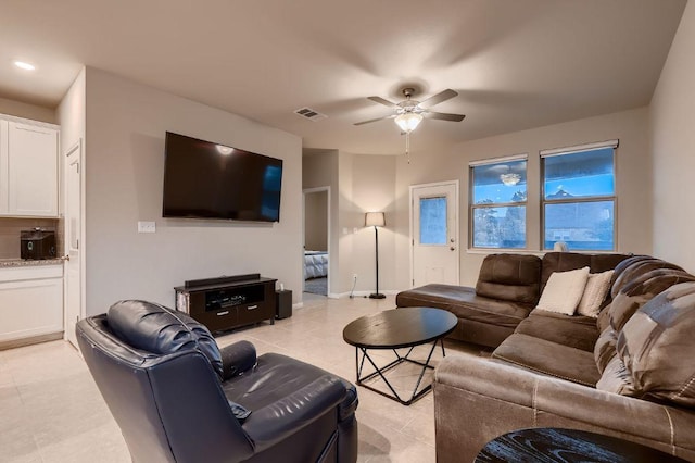 233 Mcfarland St, Georgetown, TX 78628 - living area featuring a ceiling fan, light tile patterned floors, and recessed lighting