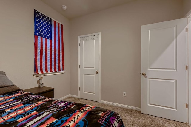 233 Mcfarland St, Georgetown, TX 78628 - bedroom featuring light carpet and baseboards