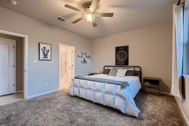 233 Mcfarland St, Georgetown, TX 78628 - bedroom featuring carpet flooring, baseboards, ensuite bathroom, and ceiling fan