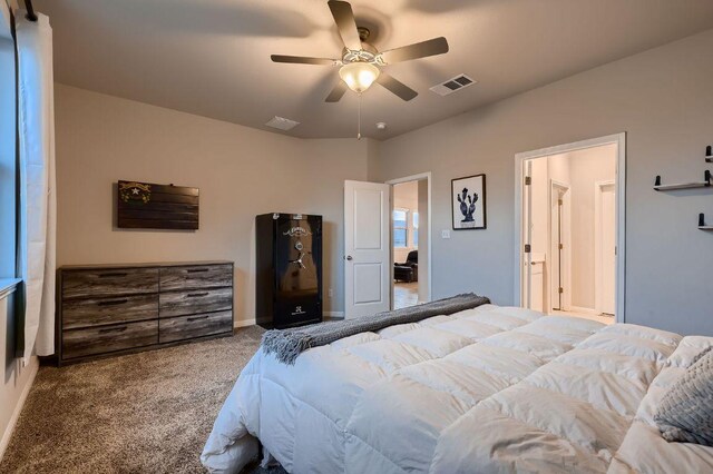 233 Mcfarland St, Georgetown, TX 78628 - bedroom with carpet flooring, a ceiling fan, and baseboards