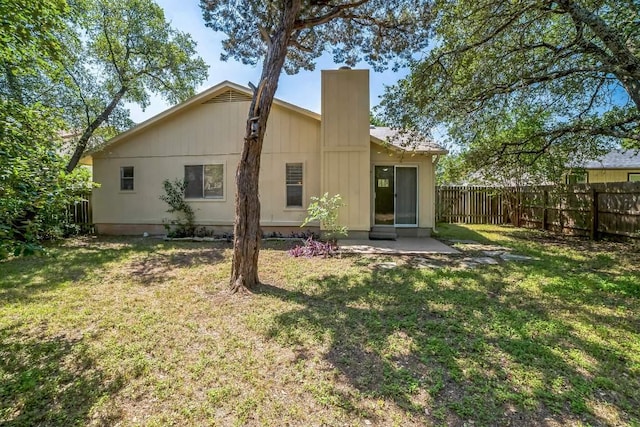 409 Mountain Laurel Dr, Cedar Park, TX 78613 - rear view of property featuring a chimney and a patio area