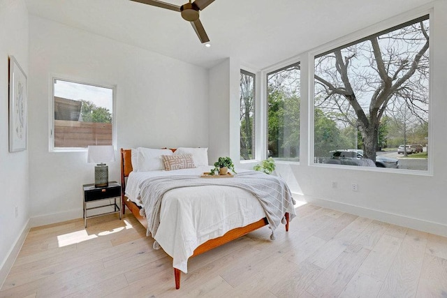 1601 Woodlawn Blvd, Austin, TX 78703 - bedroom featuring wood finished floors and a ceiling fan
