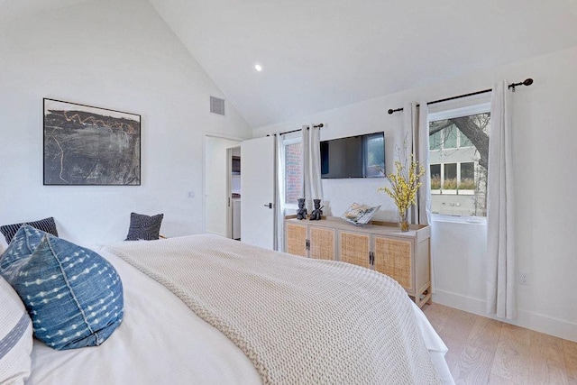 1601 Woodlawn Blvd, Austin, TX 78703 - bedroom featuring light wood-type flooring, baseboards, and high vaulted ceiling