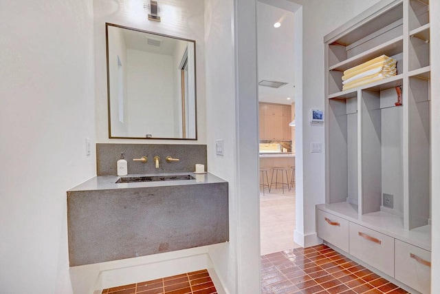 1601 Woodlawn Blvd, Austin, TX 78703 - mudroom featuring a sink