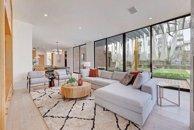 1601 Woodlawn Blvd, Austin, TX 78703 - living area with a chandelier, light wood-style flooring, and recessed lighting