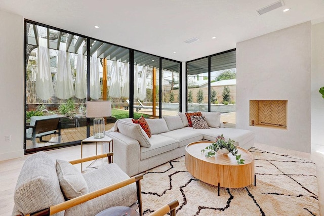 1601 Woodlawn Blvd, Austin, TX 78703 - living area with a wall of windows and recessed lighting