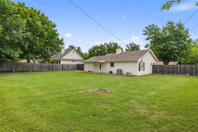 506 S Main St, Thrall, TX 76578 - view of yard with central air condition unit