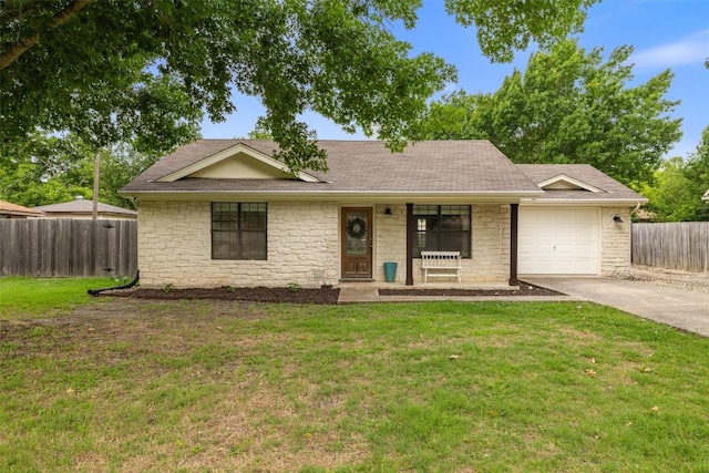 506 S Main St, Thrall, TX 76578 - ranch-style home featuring stone siding, an attached garage, driveway, and a porch