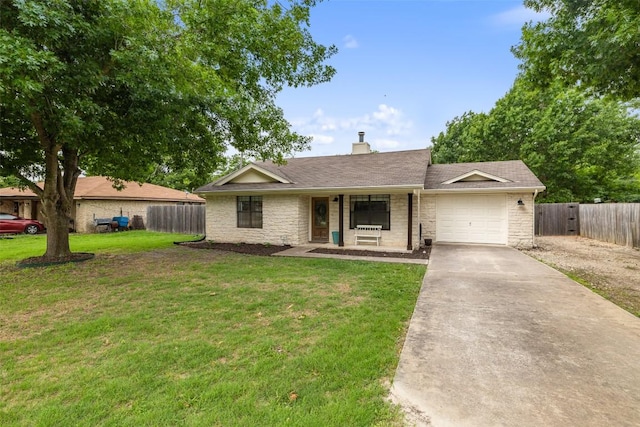506 S Main St, Thrall, TX 76578 - ranch-style house with a garage, driveway, a chimney, stone siding, and covered porch