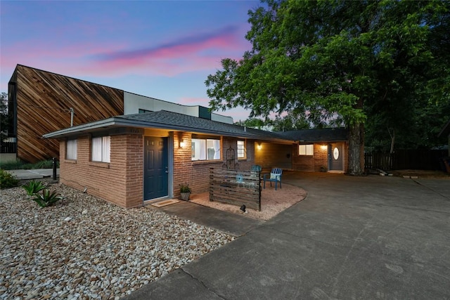 1715 Bluebonnet Ln, Austin, TX 78704 - view of front facade featuring brick siding