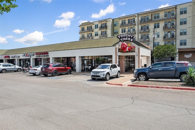 1715 Bluebonnet Ln, Austin, TX 78704 - view of commercial property featuring uncovered parking