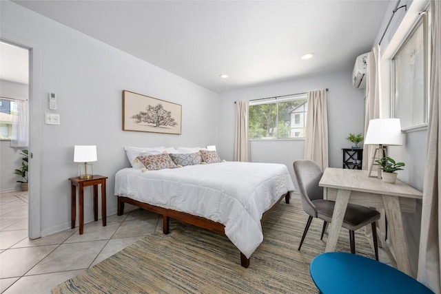 1715 Bluebonnet Ln, Austin, TX 78704 - bedroom with light tile patterned flooring, recessed lighting, baseboards, and an AC wall unit