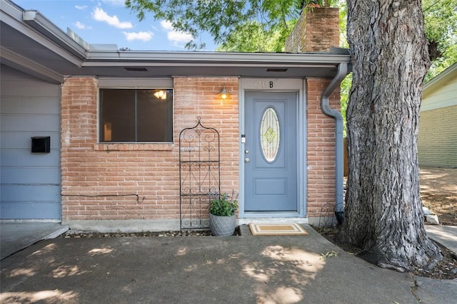 1715 Bluebonnet Ln, Austin, TX 78704 - entrance to property with brick siding and a chimney