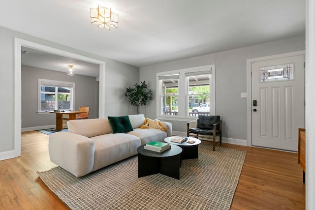 1505 Palo Duro Rd, Austin, TX 78757 - living area featuring light wood-style floors and baseboards