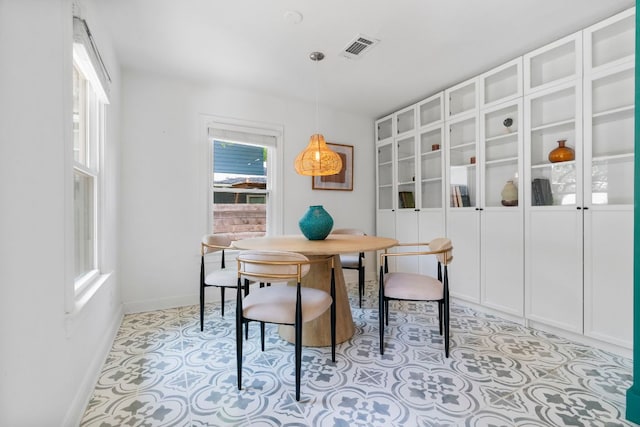 1505 Palo Duro Rd, Austin, TX 78757 - dining room with healthy amount of natural light and baseboards