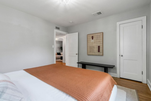 1505 Palo Duro Rd, Austin, TX 78757 - bedroom with wood finished floors and baseboards