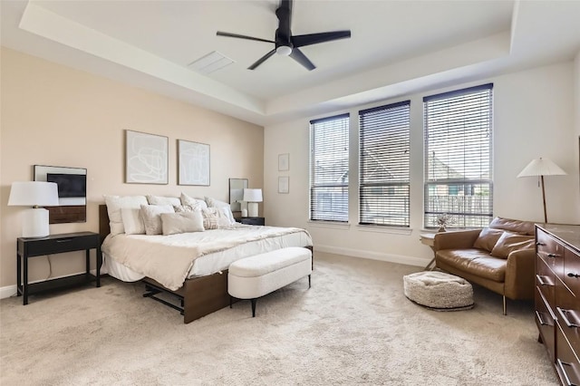 4116 Brean Down Rd, Pflugerville, TX 78660 - bedroom featuring a tray ceiling, light colored carpet, baseboards, and a ceiling fan