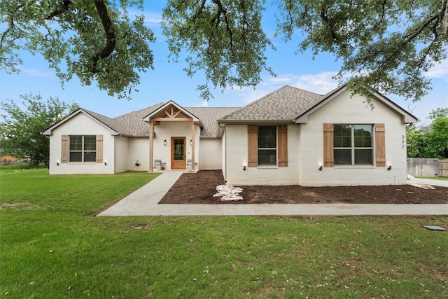 332 Claremont Dr, Belton, TX 76513 - view of front of home with a front lawn and a shingled roof