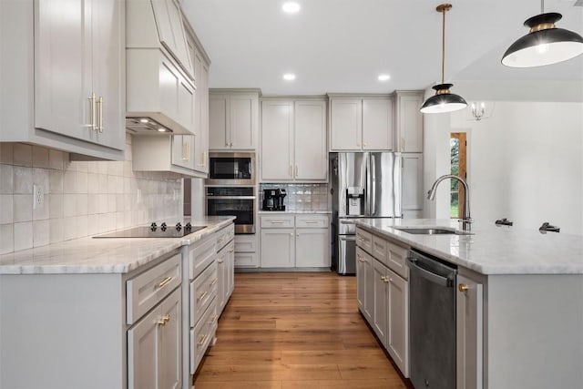 332 Claremont Dr, Belton, TX 76513 - kitchen with stainless steel appliances, gray cabinets, a sink, recessed lighting, and hanging light fixtures