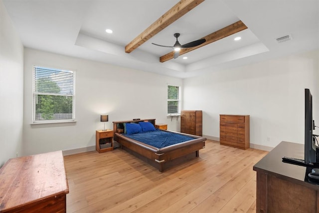 332 Claremont Dr, Belton, TX 76513 - bedroom with light wood finished floors, a raised ceiling, recessed lighting, ceiling fan, and baseboards