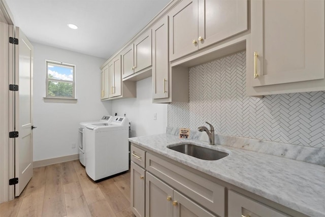 332 Claremont Dr, Belton, TX 76513 - washroom with washer and clothes dryer, cabinet space, light wood-style floors, recessed lighting, and baseboards
