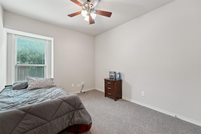722 Tom Kite Dr, Round Rock, TX 78664 - bedroom featuring light carpet, baseboards, and a ceiling fan